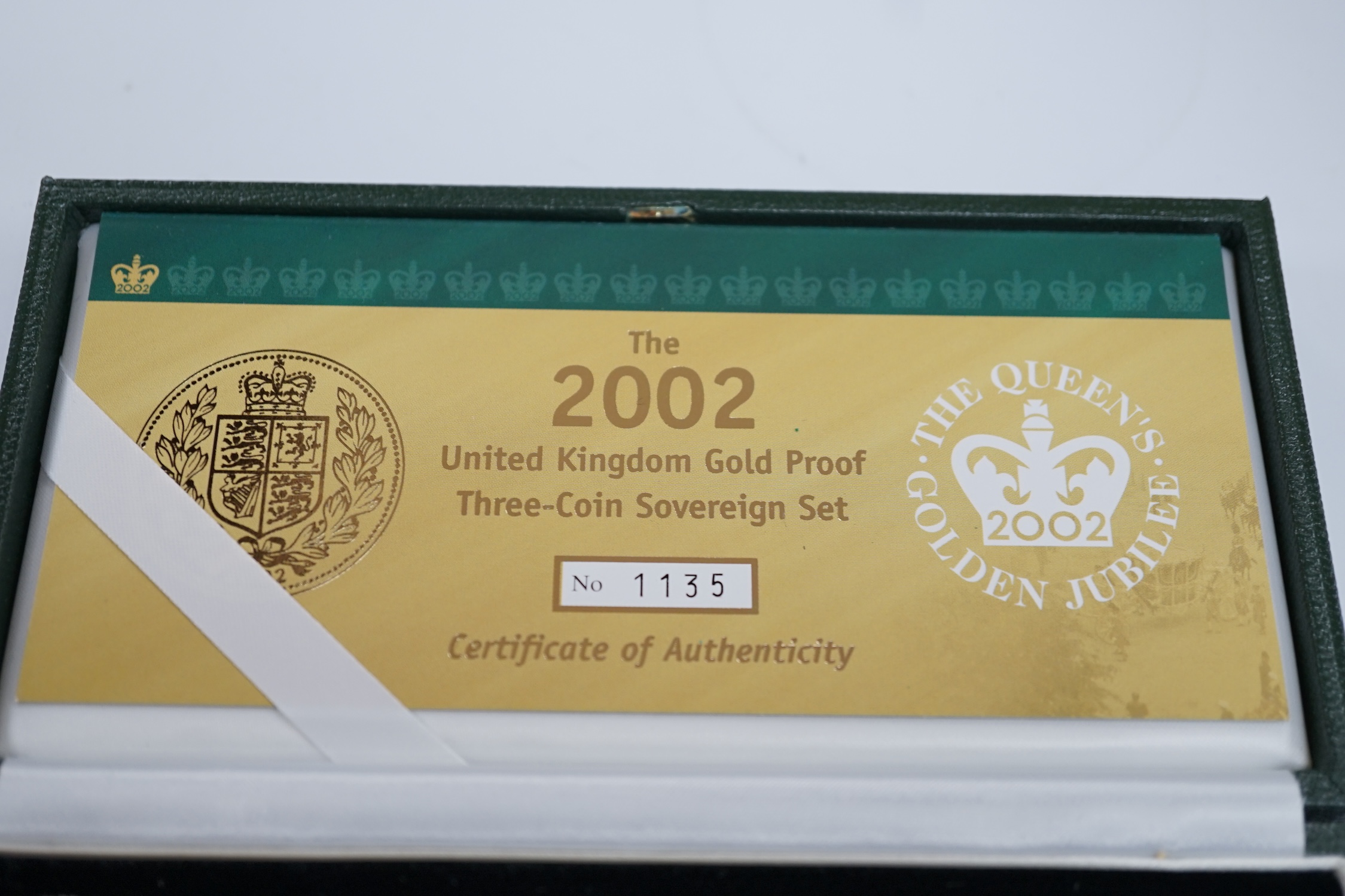 A cased 2002 United Kingdom gold proof sovereign three coin collection, with certificate.